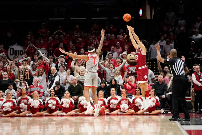 Indiana Hoosiers guard Anthony Leal (3) hits the go-ahead three pointer over Ohio State Buckeyes guard Roddy Gayle Jr. (1) during the second half of the men's basketball game at Value City Arena. Ohio State lost 76-73.